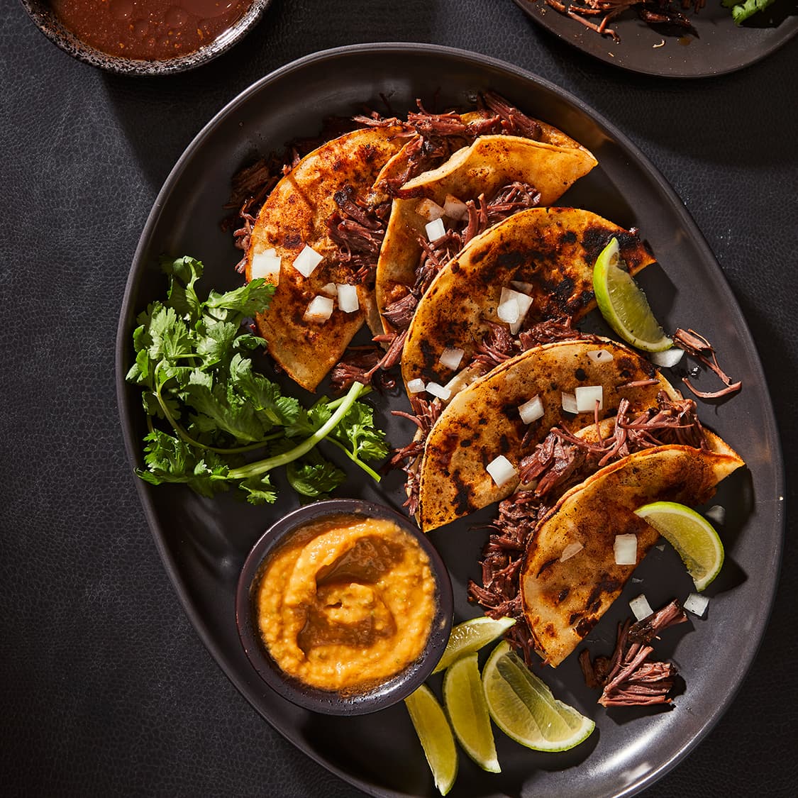 https://fleishigs.com/images/mobile-app/recipes/1046-list-birria-tacos.jpg