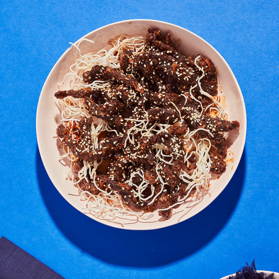 https://fleishigs.com/images/mobile-app/recipes/1186-list-estihana-shredded-crispy-beef.jpg