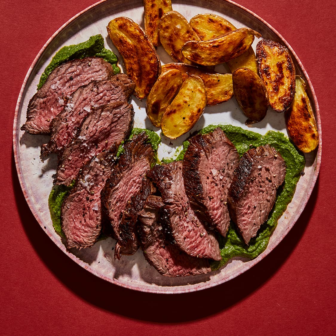 https://fleishigs.com/images/mobile-app/recipes/760-list-sous-vide-oyster-steak-with-blistered-fingerling-potatoes-with-cilantro-chimichurri.jpg